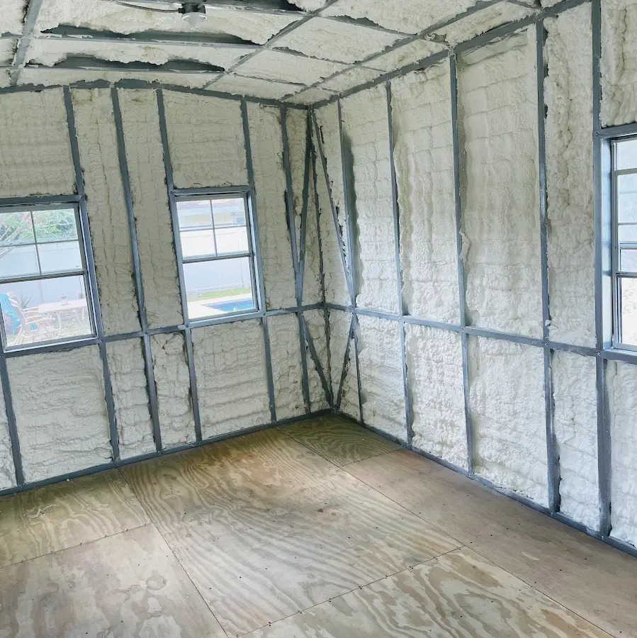 Closed-cell spray foam insulation applied to wall cavities in a residential project in Antioch